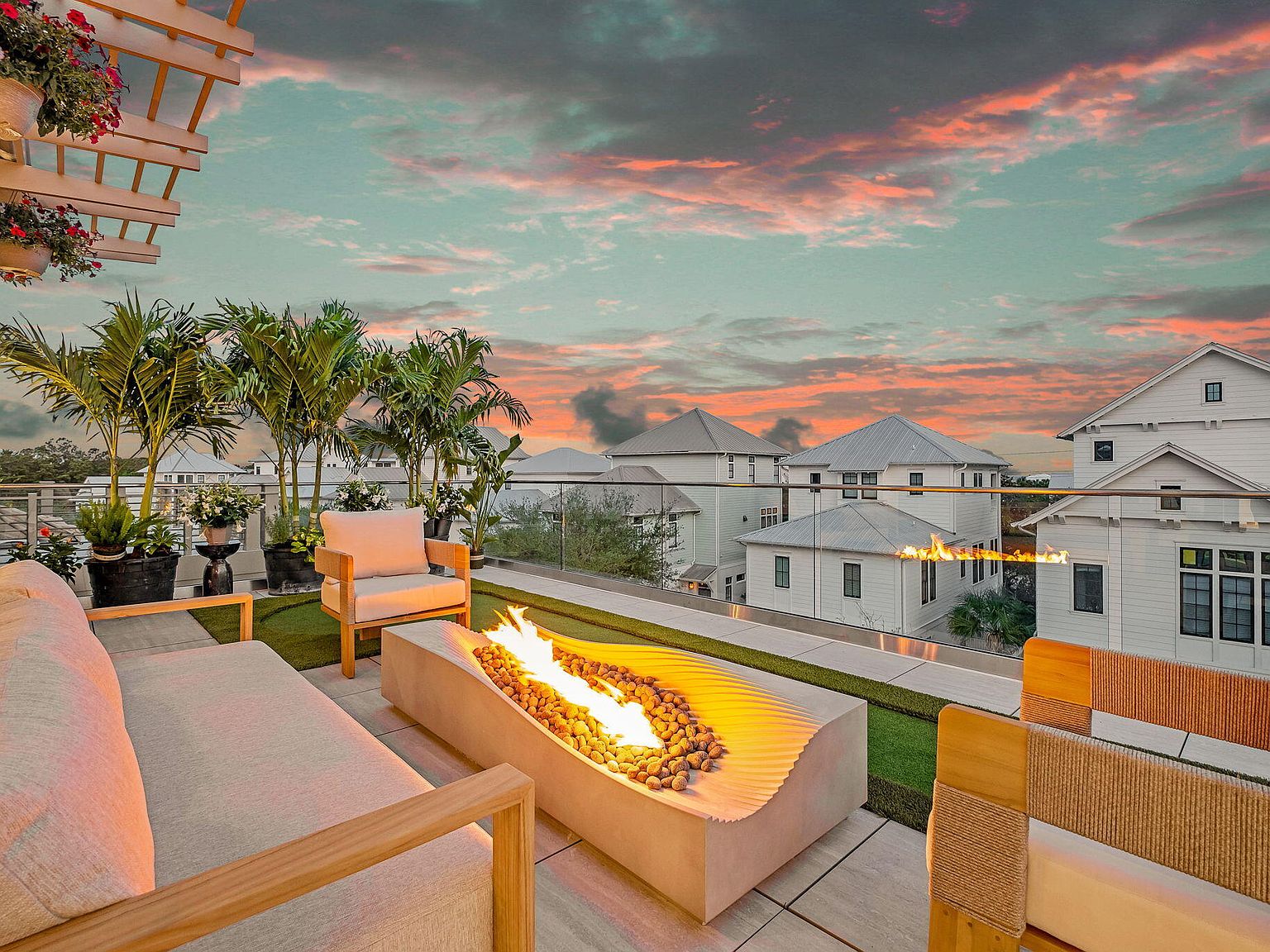 Rooftop terrace with fire pit at sunset