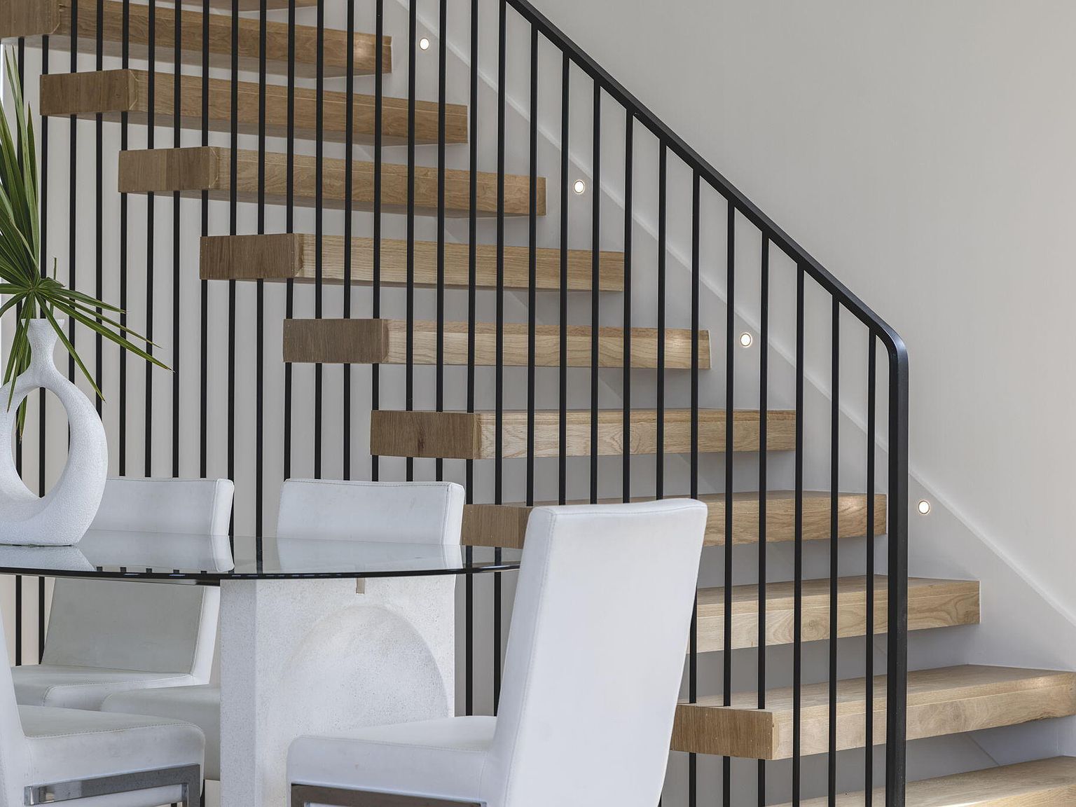 Floating staircase and dining area