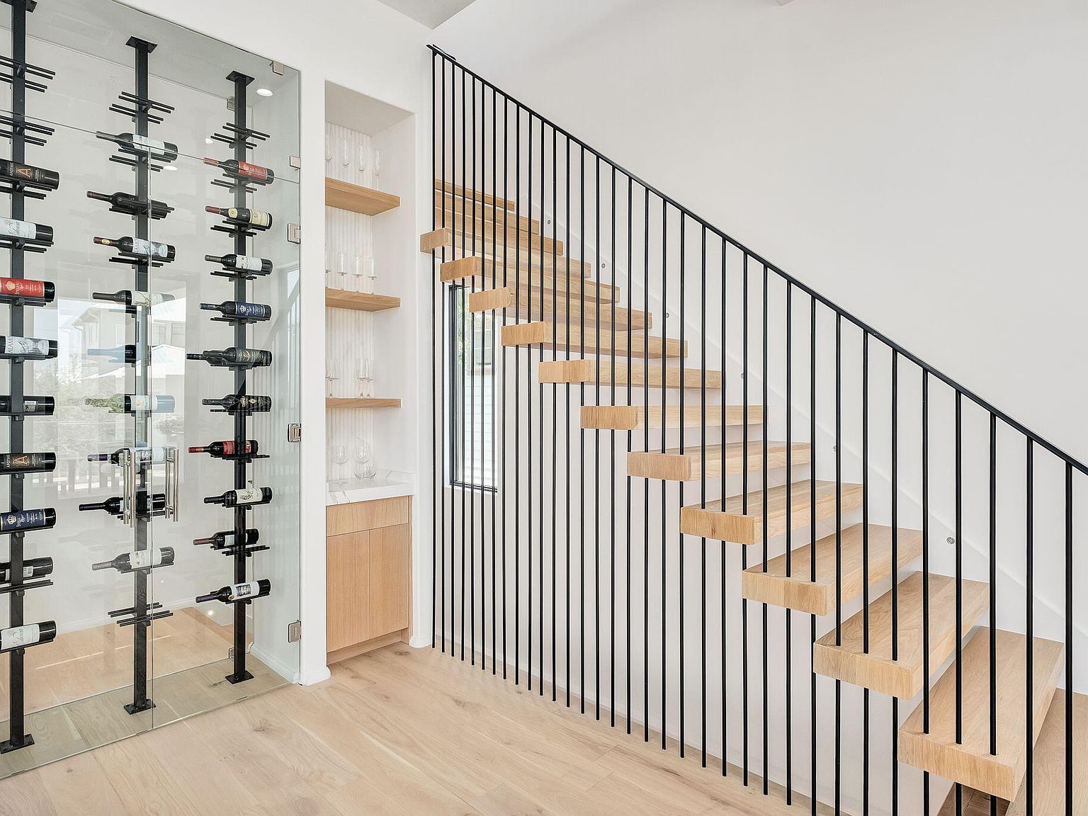 Wine display and floating staircase